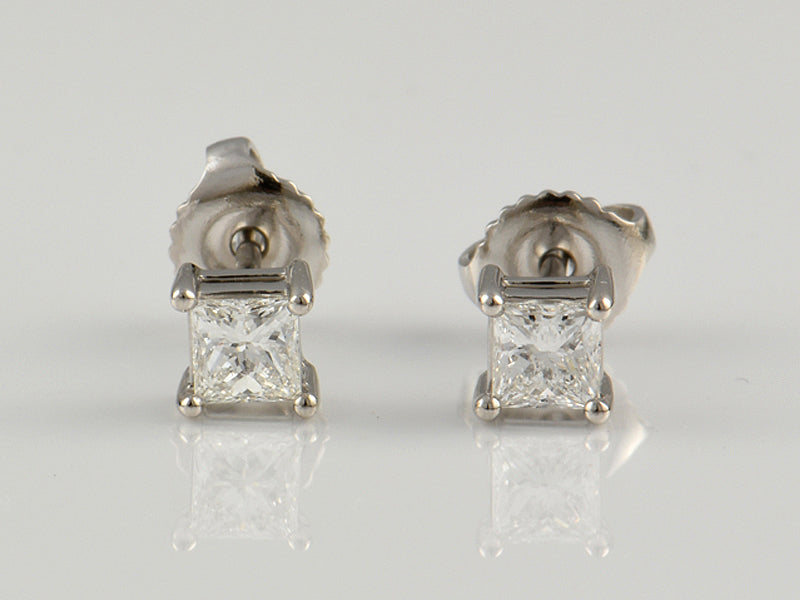 Platinum, Claw Set, Diamond 0.60ct Solitaire Stud Earrings.