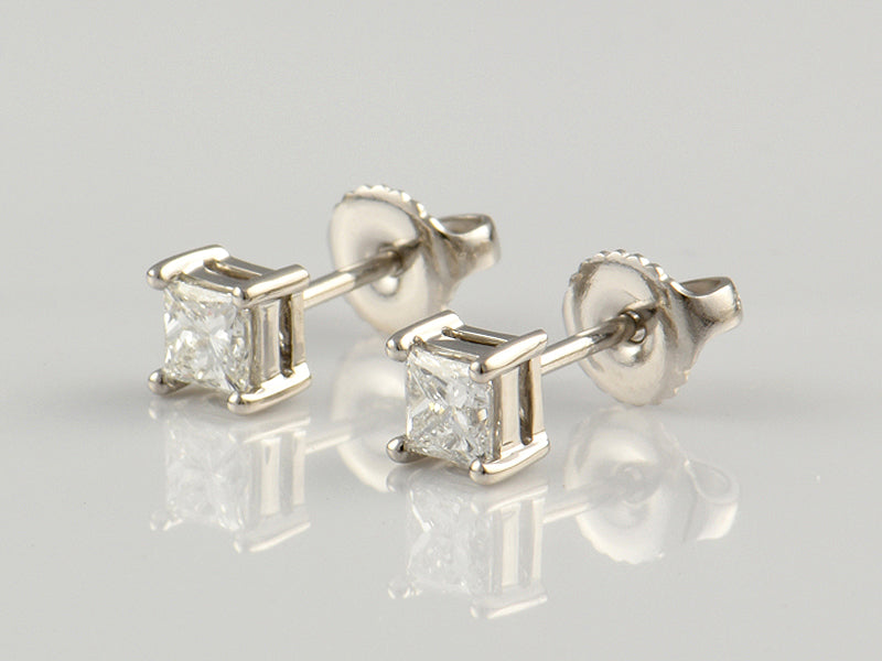 Platinum, Claw Set, Diamond 0.60ct Solitaire Stud Earrings.