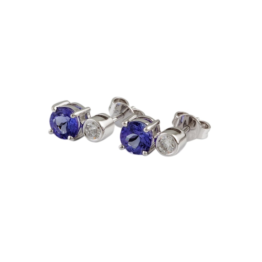 9ct white gold tanzanite and diamond cluster earrings.