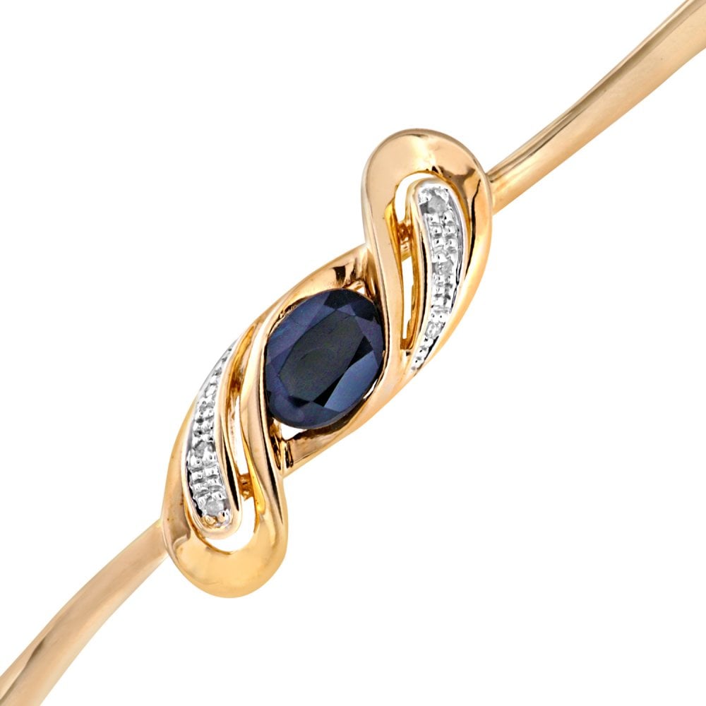 SPARKLD 9ct Yellow Gold Oval Sapphire and 0.02ct Diamond Crossover Bangle