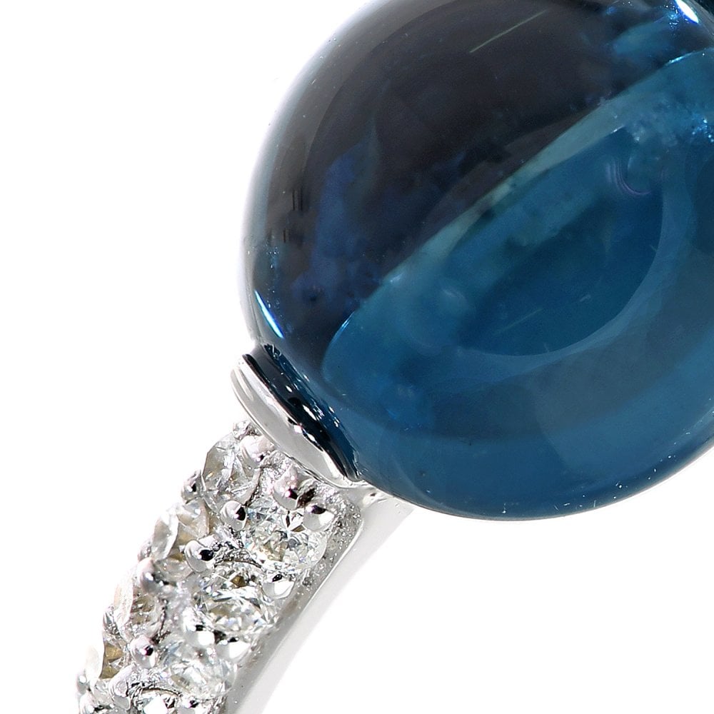 SPARKLD 9ct White Gold Blue Topaz and 0.17ct Diamond Shoulder Engagement Ring