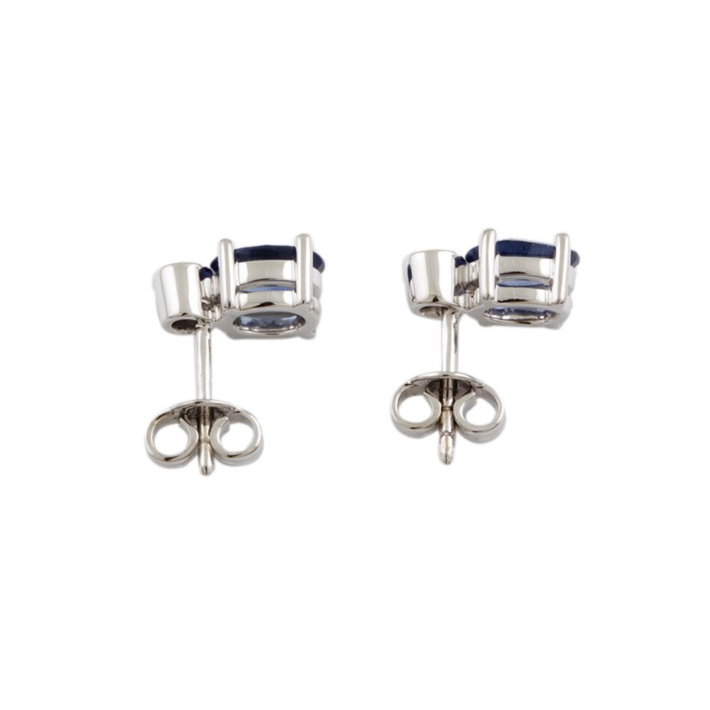 White Gold 0.10ct Round Brilliant Cut Diamond and 1.62ct Oval Blue Sapphire Two Stone Drop Earrings