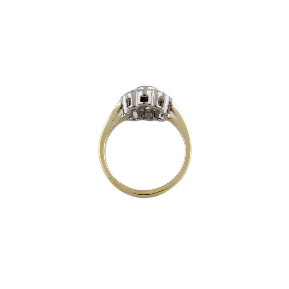 Yellow and White Gold 0.58ct Oval Blue Sapphire and 0.60ct Round Brilliant Diamond Cluster Ring