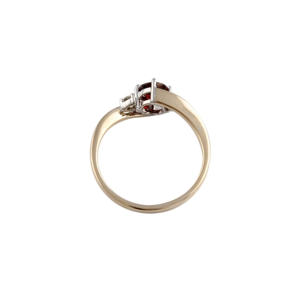 Yellow and White Gold 0.12ct Round Brilliant Diamond and 0.58ct Round Garnet Three Stone Ring