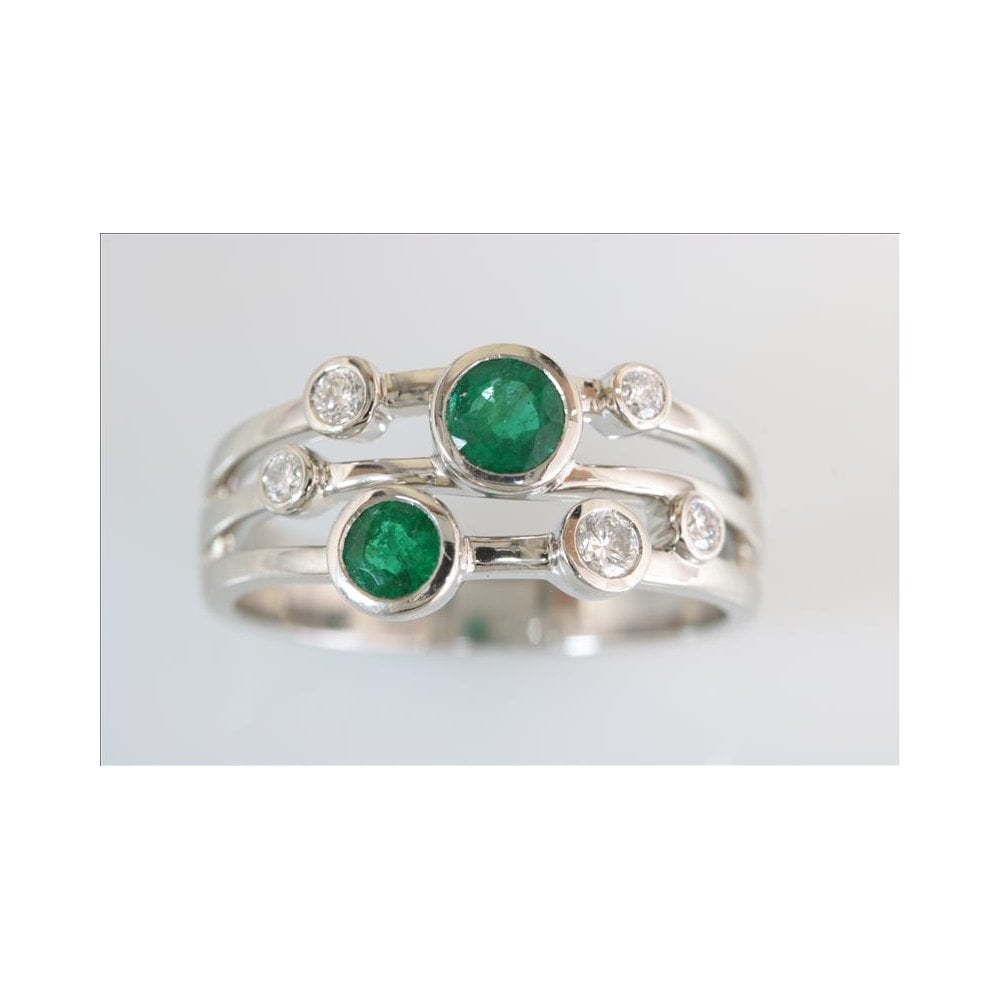 Platinum Emerald 0.76ct And Diamond 0.25ct Dress Ring