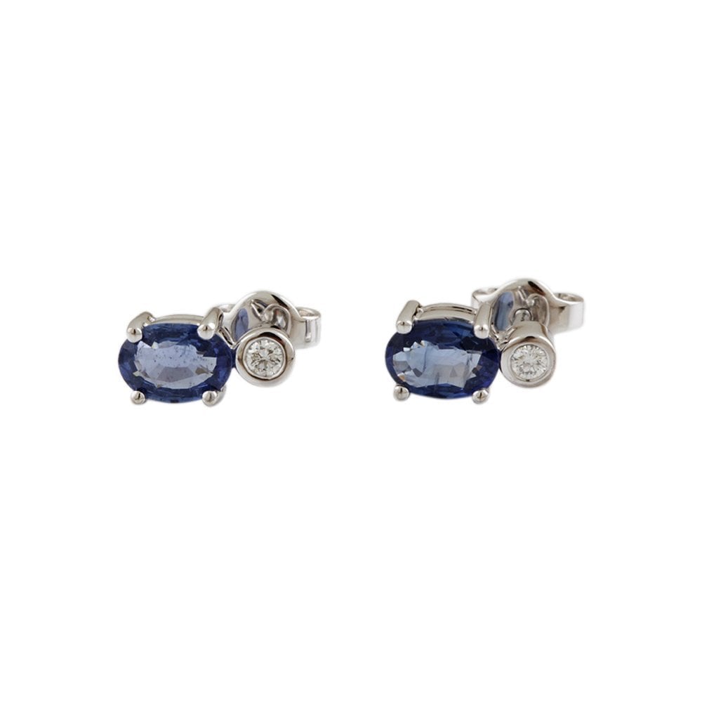 White Gold 0.10ct Round Brilliant Cut Diamond and 1.62ct Oval Blue Sapphire Two Stone Drop Earrings
