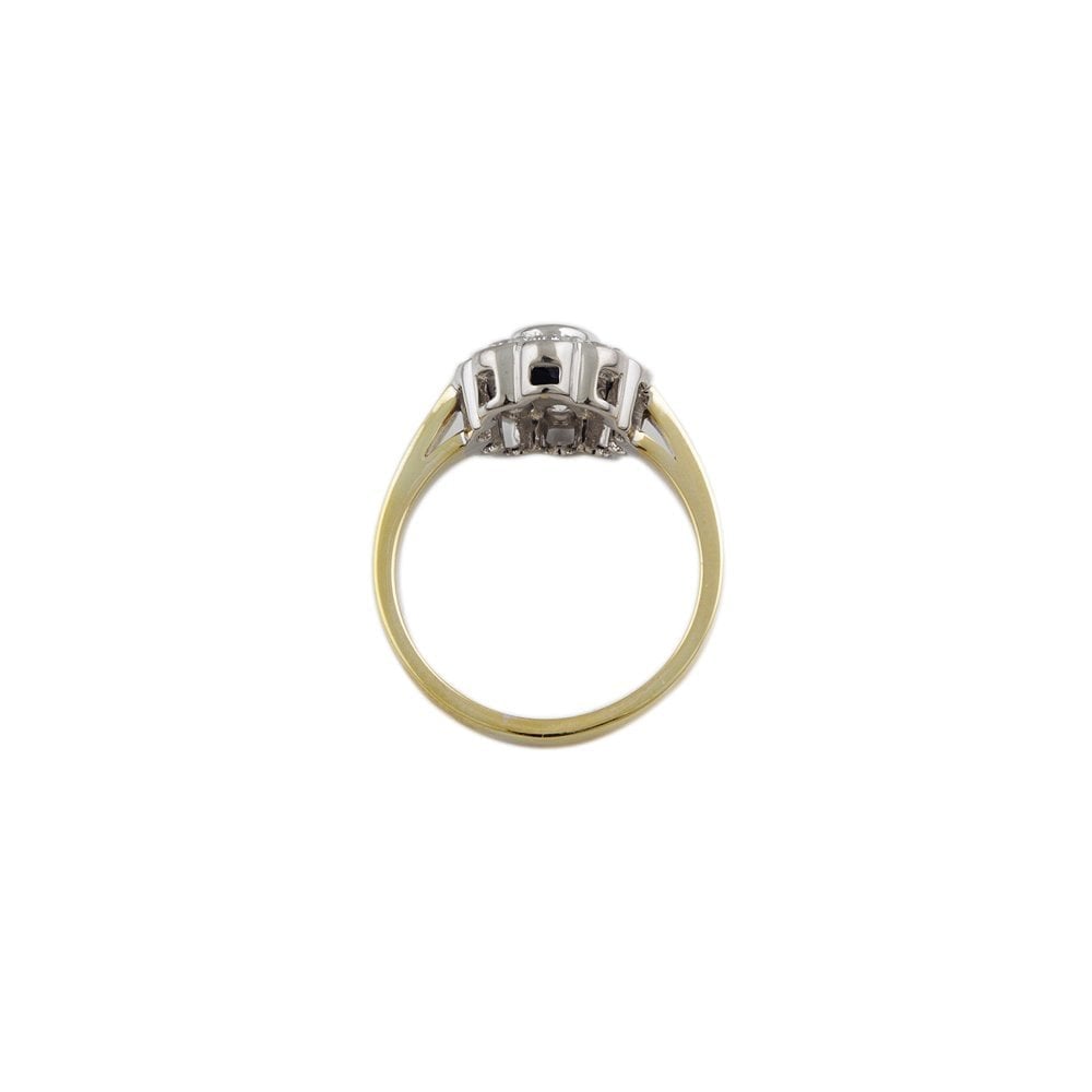 Yellow and White Gold 0.58ct Oval Blue Sapphire and 0.60ct Round Brilliant Diamond Cluster Ring