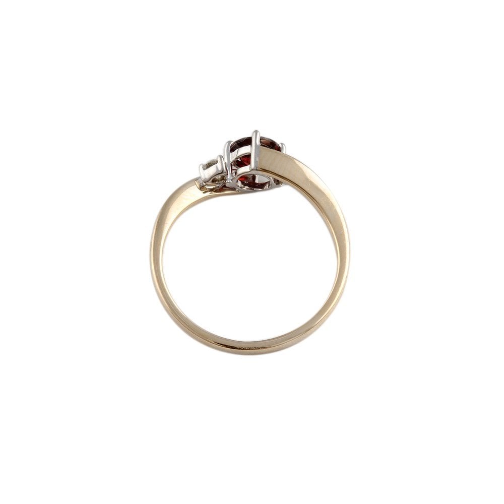 Yellow and White Gold 0.12ct Round Brilliant Diamond and 0.58ct Round Garnet Three Stone Ring