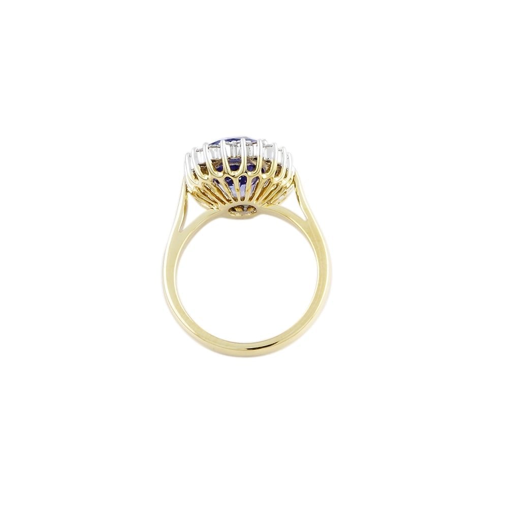 PLATINUM CLUSTER RING WITH 6.34CT TANZANITE AND 0.59CT DIAMONDS