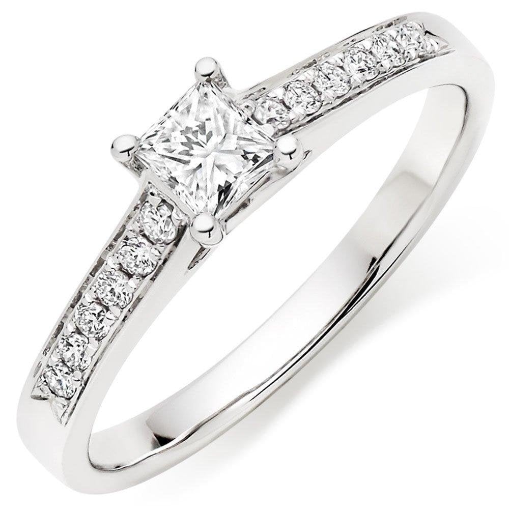18ct princess cut solitaire ring with diamond set shoulders