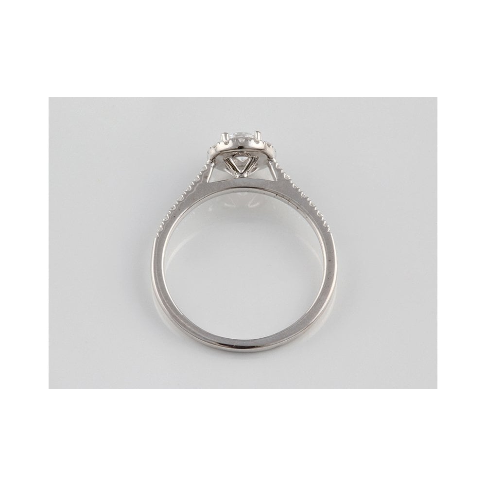 9ct White gold halo design ring with diamond set shoulders Total weight  0.50ct