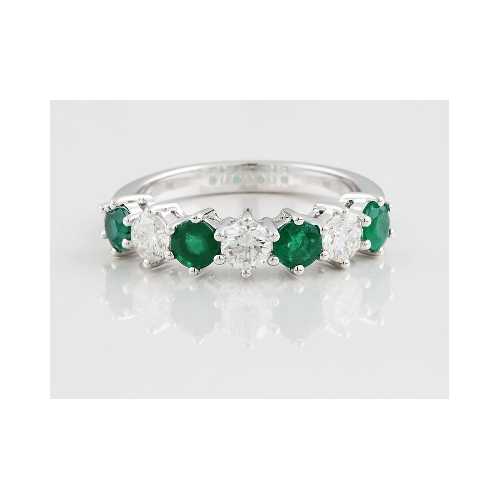 Platinum Emerald and Diamond seven stone ring