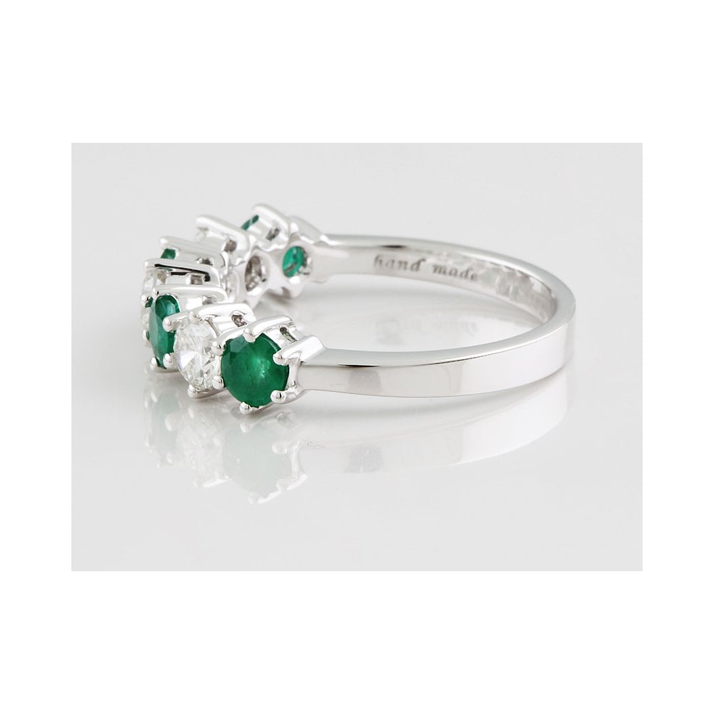 Platinum Emerald and Diamond seven stone ring