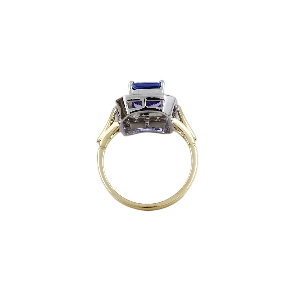 Yellow and White Gold 0.45ct Round Diamond and 3.31ct Emerald cut Tanzanite Set Cluster Ring