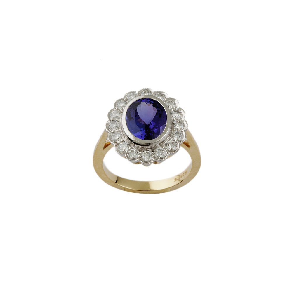 Yellow and White Gold 0.79ct Round Diamond and 3.70ct Oval Tanzanite Set Cluster Ring
