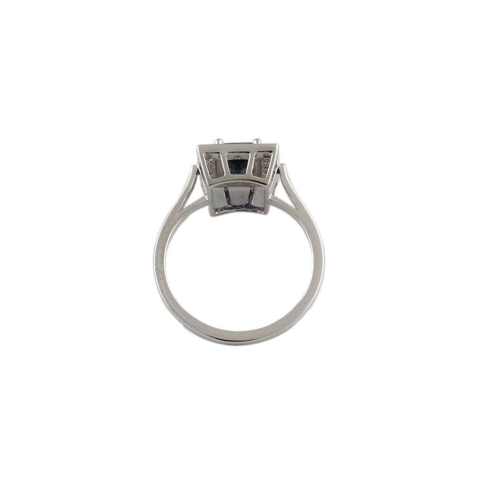 White Gold 0.19ct Round Diamond and 1.20ct Emerald Shaped Blue Sapphire Set Cluster Ring