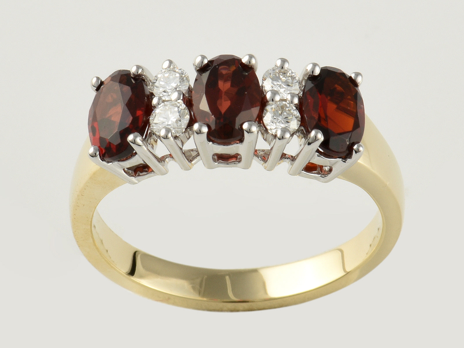 9ct Yellow gold, White Gold Claw Set, Garnet 1.80ct and Diamond 0.20ct Dress Ring