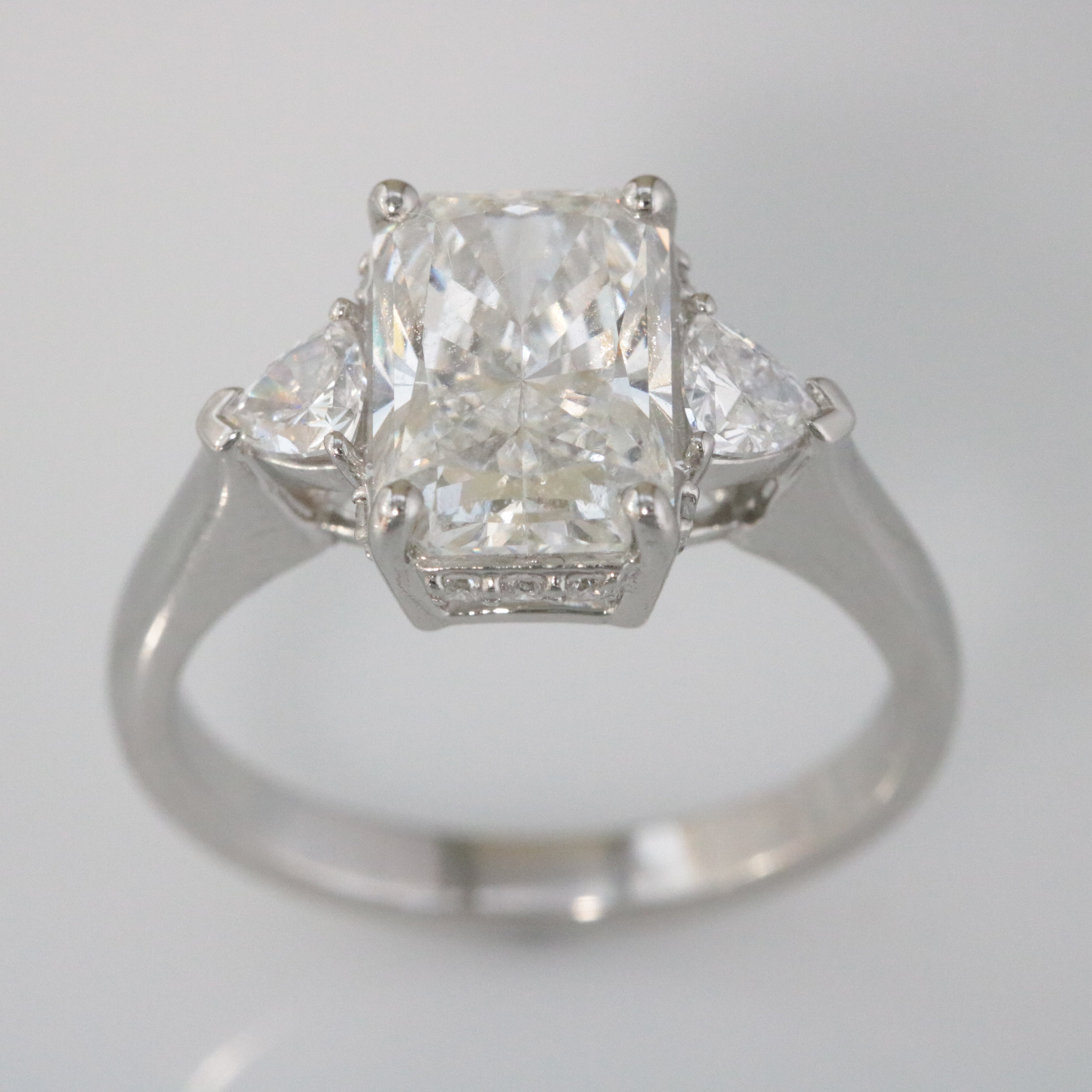 Platinum, Claw Set, IGI Certificated Laboratory Grown Diamond 3.47ct Three Stone Ring With Hidden Halo