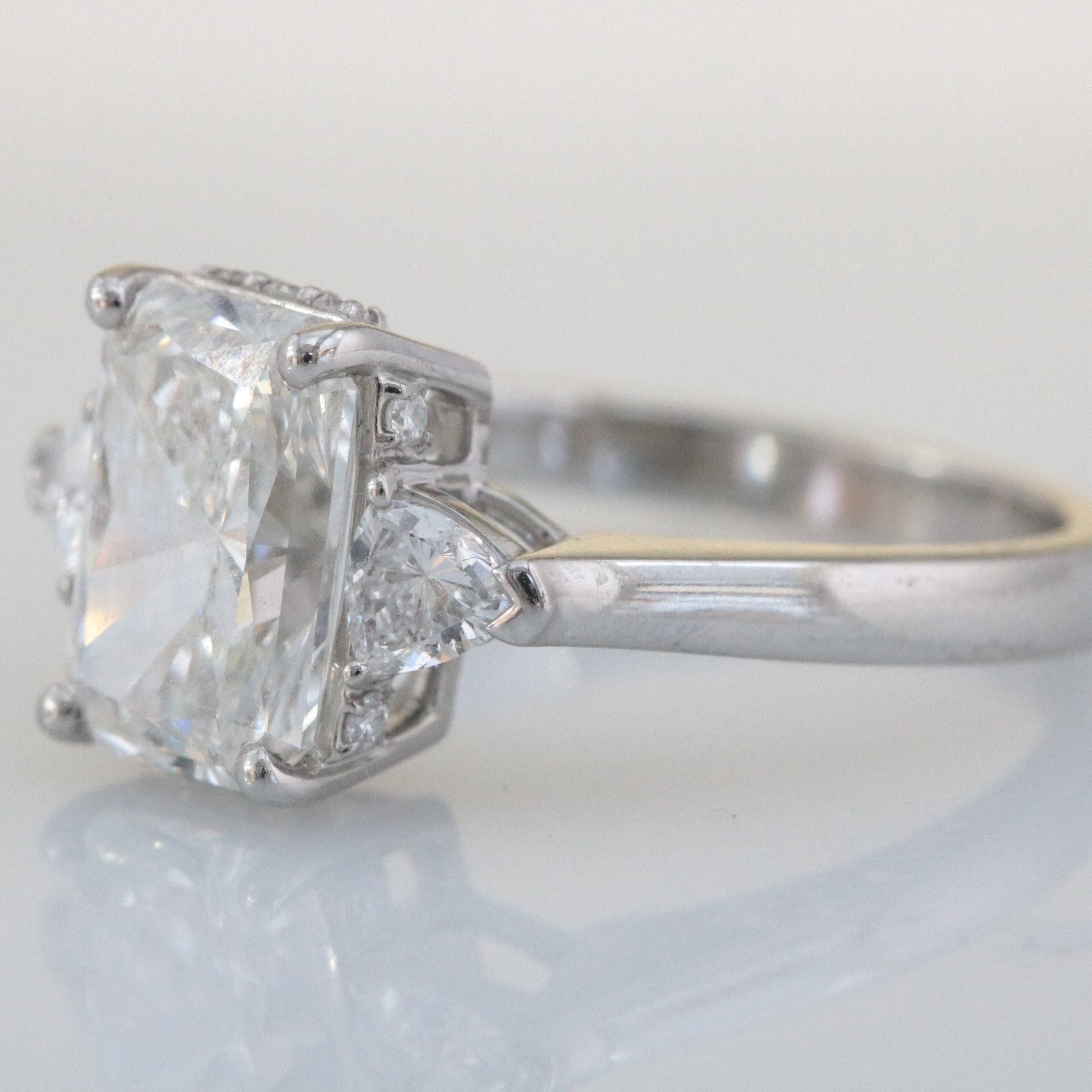 Platinum, Claw Set, IGI Certificated Laboratory Grown Diamond 3.47ct Three Stone Ring With Hidden Halo