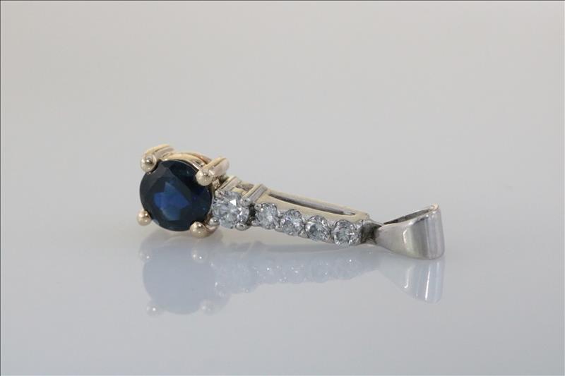 9ct yellow gold and white gold sapphire 0.44ct and diamond pendant 0.10ct